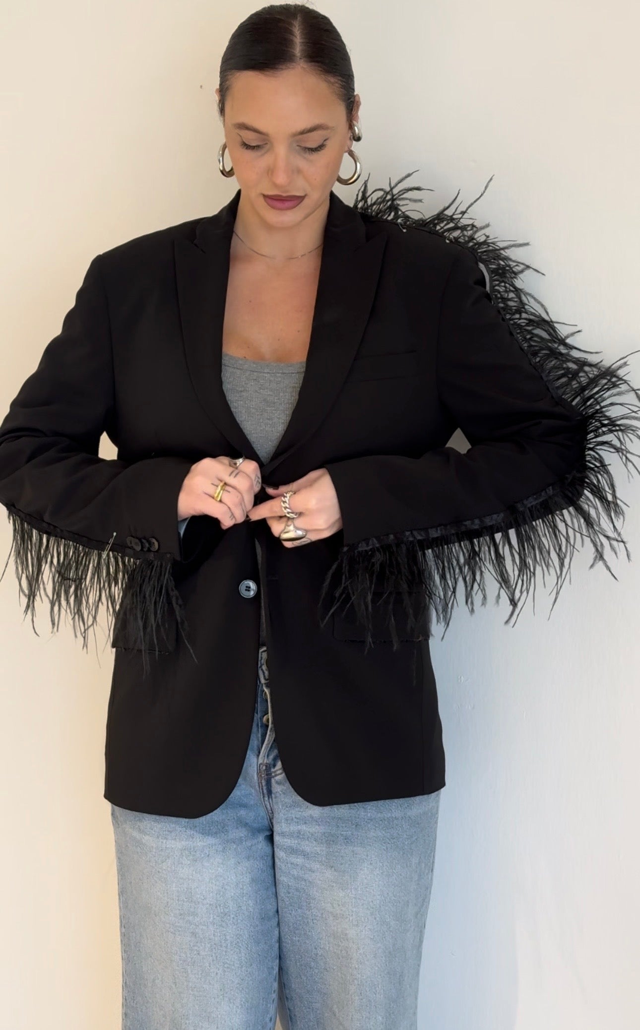 Marrone con piuma nera